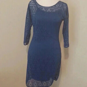 -- See-through, knitted dark blue dress